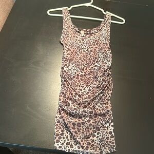 Sweet Pea cheetah print mesh tank top with Rouging on each side